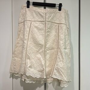 Cream skirt.